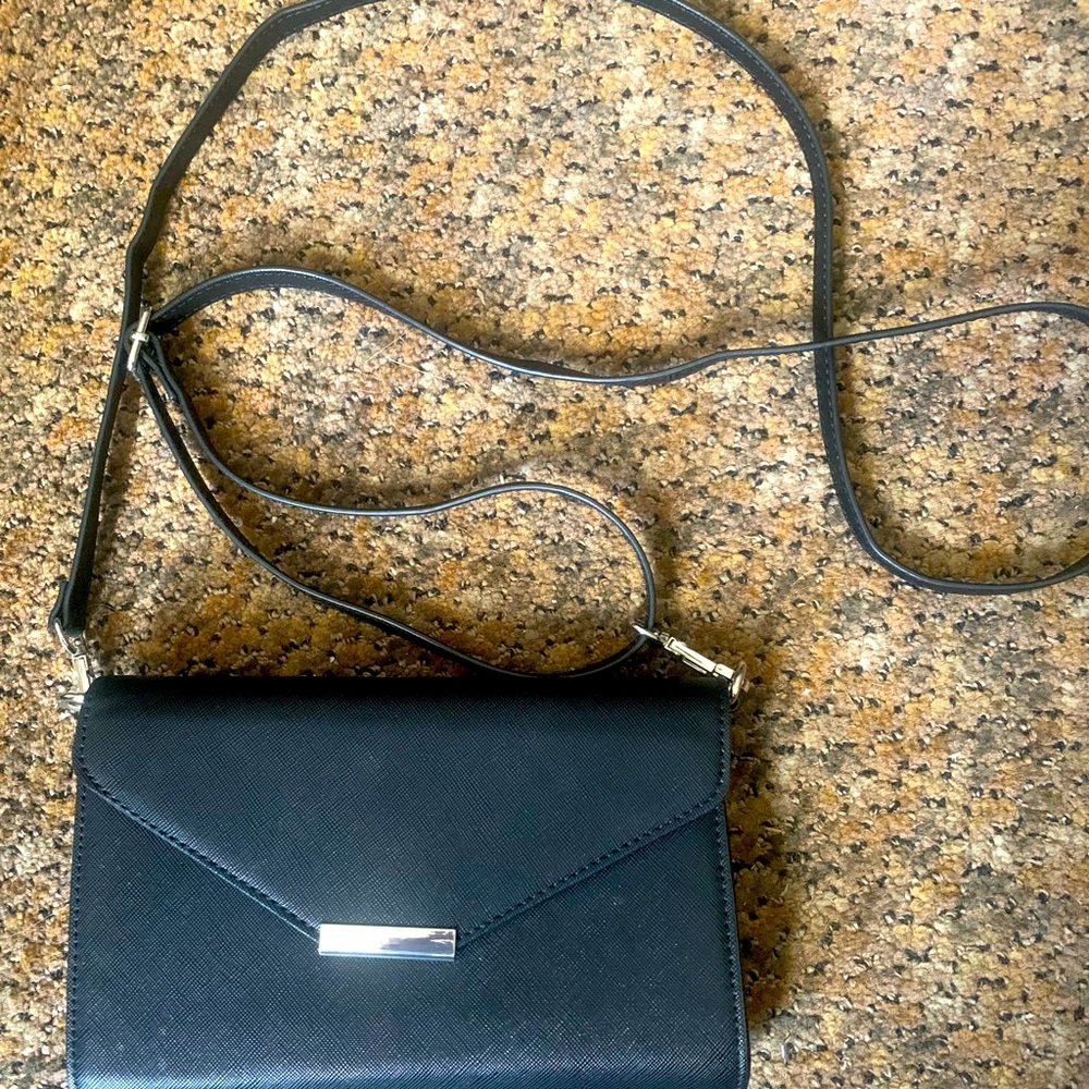 Save The Girls Crossbody clutch touch screen purse. EUC